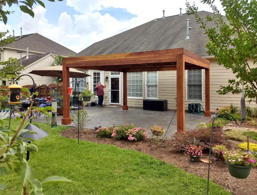 Modern Louvered Garden Pergola (Options: 16' L x 16' W, 8'' x 8'' Posts, Mobile Louvers, California Redwood, 9 ft H, No Electrical Wiring Trim, No Curtain Rods, 4 Post Anchor Kit for Concrete, No Post Decorative Trims, No Ceiling Fan Base, Transparent Premium Sealant). Photo Courtesy of J. McLaughlin of Cary, North Carolina.