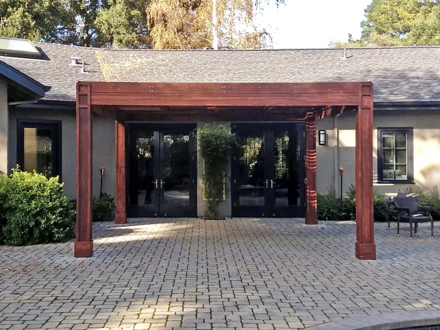 Modern Louvered Garden Pergola (Options: 16' L x 16' W, 8'' x 8'' Posts, Mobile Louvers, California Redwood, 9.5 ft H, 1 Electrical Wiring Trim, No Curtain Rods, 4 Post Anchor Kit for Concrete, 1 Ceiling Fan Base, Custom Vertical Trim Kits for The Posts, Coffee-Stain Premium Sealant). Photo Courtesy of L. Arms of Atherton, California.