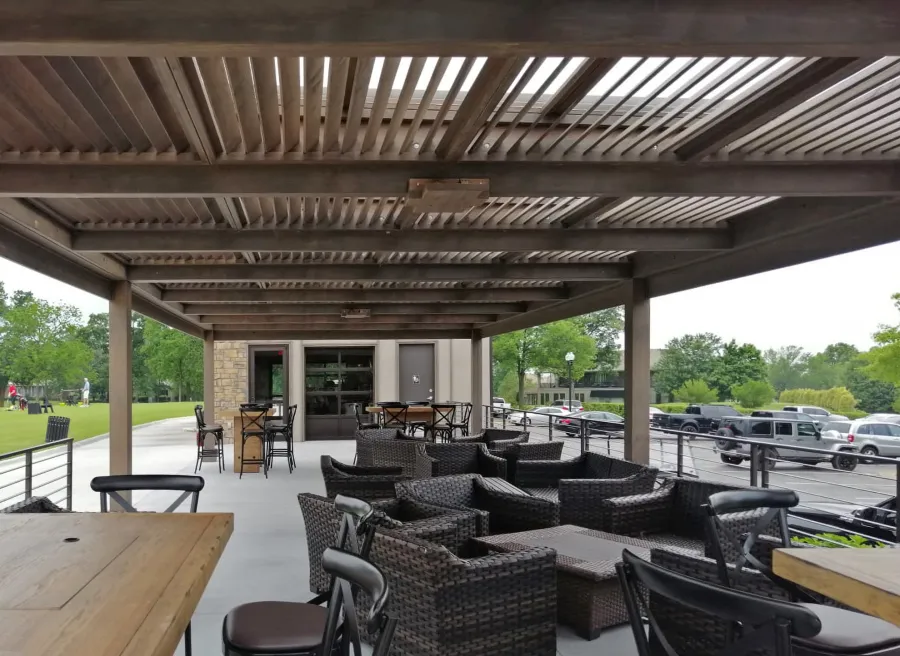 Modern Louvered Garden Pergola (Options: 44' L x 18' W, 8'' x 8'' Posts, Mobile Louvers, Douglas-fir, 10 ft H, No Electrical Wiring Trim, 4 Curtain Rods, 6 Post Anchor Kit for Concrete, With Clear Polycarbonate Roofing Atop Pergola Framing by Custom Request, No Post Decorative Trims, No Ceiling Fan Bases, Coffee-Stain Premium Sealant). Photo Courtesy of M. Hudson of Rogers, Arkansas.
