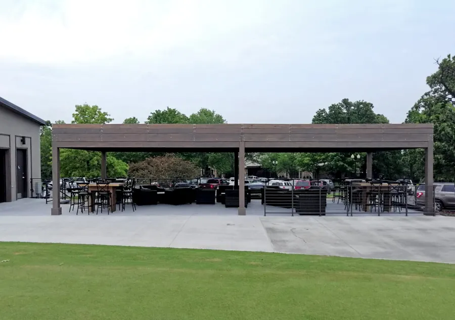Modern Louvered Garden Pergola (Options: 44' L x 18' W, 8'' x 8'' Posts, Mobile Louvers, Douglas-fir, 10 ft H, No Electrical Wiring Trim, 4 Curtain Rods, 6 Post Anchor Kit for Concrete, With Clear Polycarbonate Roofing Atop Pergola Framing by Custom Request, No Post Decorative Trims, No Ceiling Fan Bases, Coffee-Stain Premium Sealant). Photo Courtesy of M. Hudson of Rogers, Arkansas.
