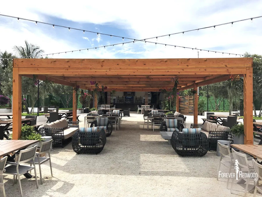 Modern Louvered Garden Pergola (Options: 40' L x 24' W, 8'' x 8'' Posts, Mobile Louvers, Douglas-fir, 10 ft H, No Electrical Wiring Trim, 6-Post Anchor Kit for High-Wind, No post decorative trims, No Ceiling Fan Base, Transparent Premium Sealant). Photo Courtesy of the Miami Open at Dolphins Stadium in Miami, Florida.
