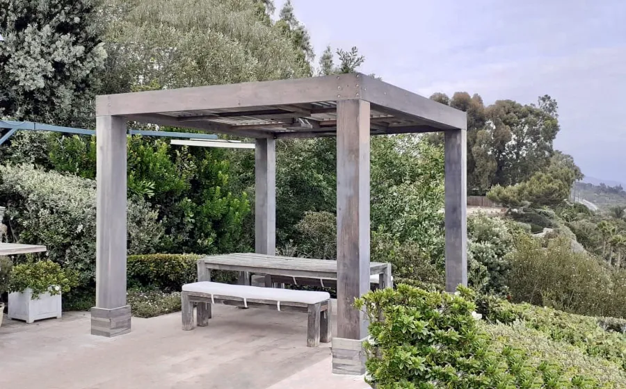 Custom Modern Louvered Garden Pergola (Options: 12' L x 10' W, 10'' x 10'' Posts, Mobile Louvers, California Redwood, 9 ft H, 1 Electrical Wiring Trim, No Curtain Rods, 4 Post Anchor Kit for Concrete, 1 Ceiling Fan Base, Custom Weathered Finish by Custom Request is Lifetime Wood Treatment-Valhalco). Photo Courtesy of O. Case of Malibu, California.