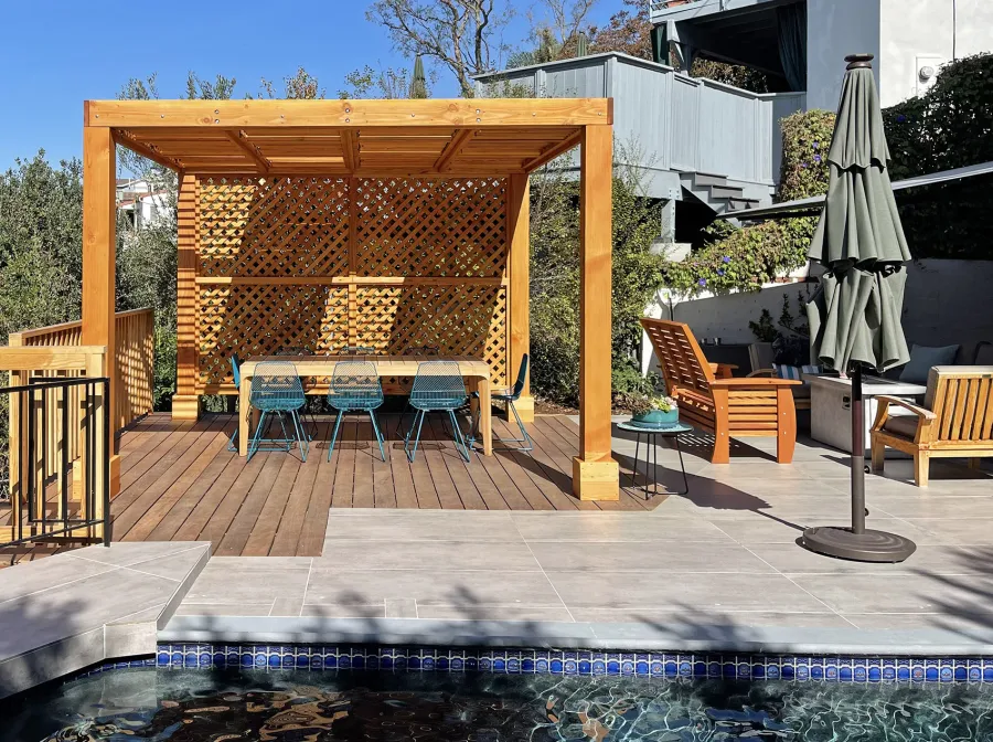 Modern Louvered Garden Pergola (Options: 12' L x 12' W, 8'' x 8'' Posts, Mobile Louvers, Douglas-fir, with 1 Lattice Privacy Wall, Electrical Wiring Trim for 1 Post, Without Fascia, No Curtain Rods, 4 Post Anchor Kit for Wood, No Post Decorative Trims, No Ceiling Fan Base, Transparent Premium Sealant). Photo Courtesy of S. Weinswig of Los Angeles, CA.