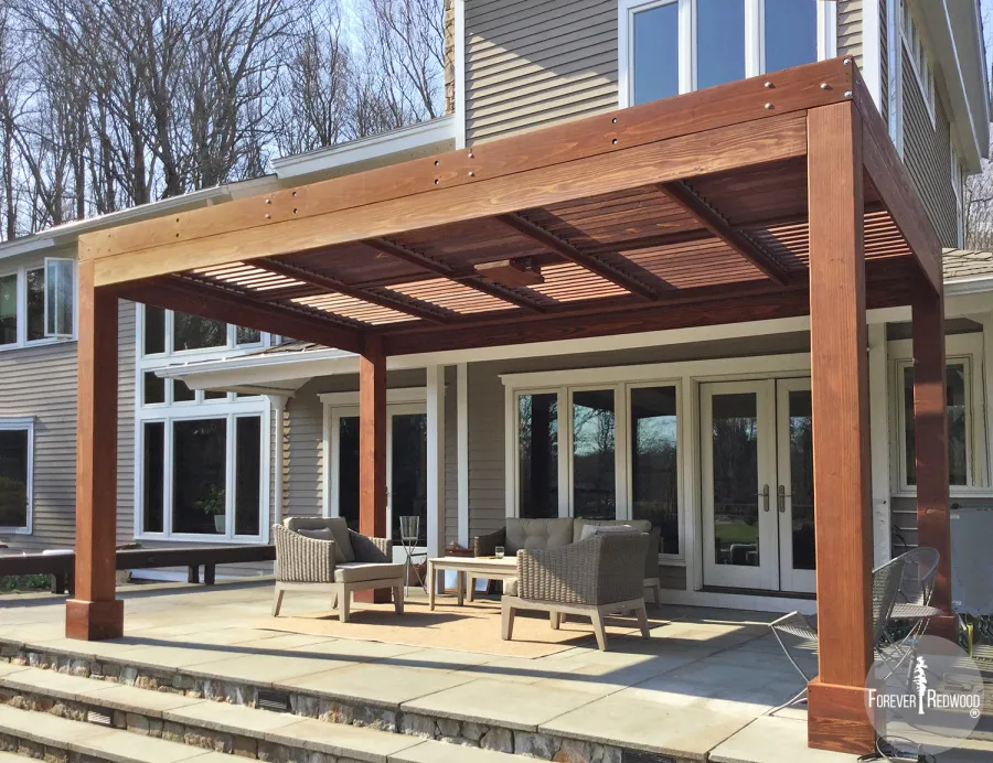 Modern Louvered Garden Pergola (Options: 10' L x 17' W, 8'' x 8'' Posts, Mobile Louvers, California Redwood, 9 ft H, No Electrical Wiring Trim, 4 Post Anchor Kit for Concrete, No post decorative trims, With a Ceiling Fan Base, Coffee-Stain Premium Sealant). Photo Courtesy of A. Gree of Redding, CT.