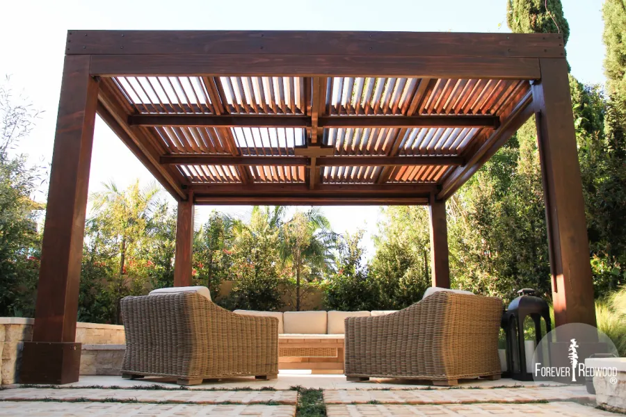 Modern Louvered Garden Pergola (Options: 16' L x 16' W, 10'' x 10'' Posts, Mobile Louvers, California Redwood, 9.5ft H, Electrical Wiring Trim for 1 Post, 4 Post Anchor Kit for Concrete, No post decorative trims, Add a Ceiling Fan Base, 4 Curtain Rods, Coffee Stain Sealant). Photo Courtesy of S. Gillin of Del Mar, CA.