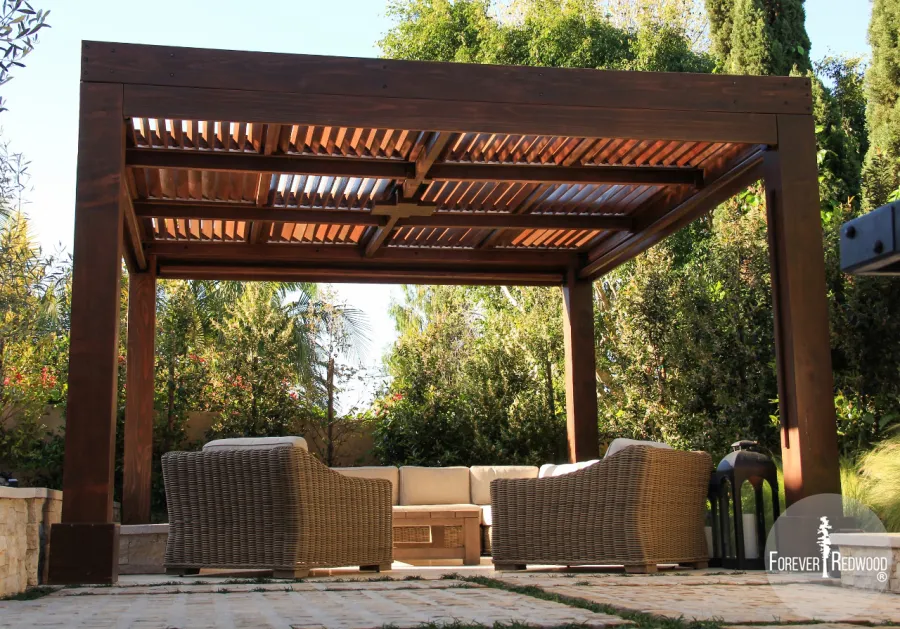 Modern Louvered Garden Pergola (Options: 16' L x 16' W, 10'' x 10'' Posts, Mobile Louvers, California Redwood, 9.5ft H, Electrical Wiring Trim for 1 Post, 4 Post Anchor Kit for Concrete, No post decorative trims, Add a Ceiling Fan Base, 4 Curtain Rods, Coffee Stain Sealant). Photo Courtesy of S. Gillin of Del Mar, CA.