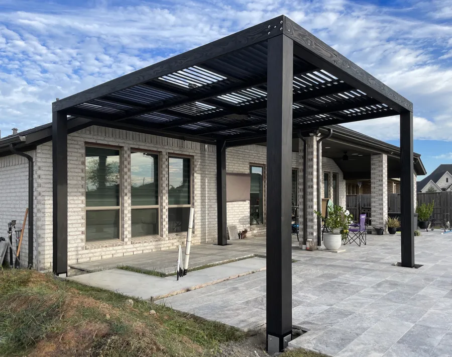 Modern Louvered Garden Pergola (Options: 16' L x 14'-6" W, 8'' x 8'' Posts, Mobile Louvers, Douglas-fir, Electrical Wiring Trim for 1 Post, Without Fascia, No Curtain Rods, 4 Post Anchor Kit for Concrete, No Post Decorative Trims, 1 Ceiling Fan Base, Black Stain Premium Sealant). Photo Courtesy of J. Roan of Katy, TX.