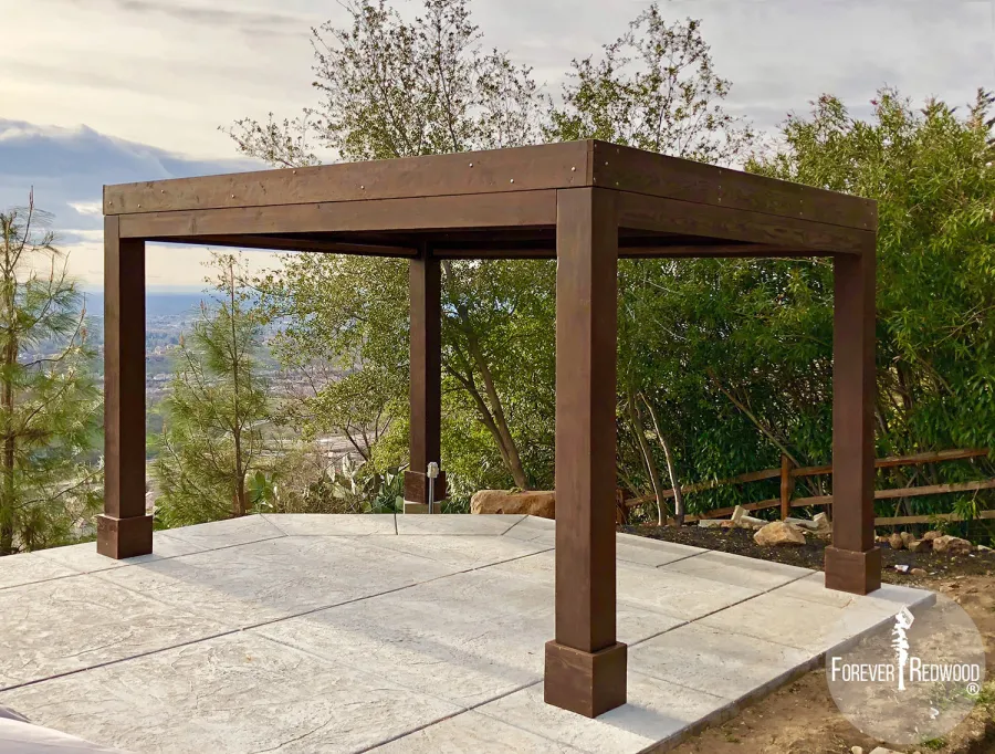 Modern Louvered Garden Pergola (Options: 16' L x 12' W, 10'' x 10'', Fixed Louvers, Douglas-fir, 9.5 ft H, No Electrical Wiring Trim Kit, 4 Post Anchor Kit for Concrete, No Post Decorative Trims, No Ceiling Fan Base, 4 Curtain Rods, Coffee Stain Sealant). Photo Courtesy of R. McCan of El Dorado Hills, CA.
