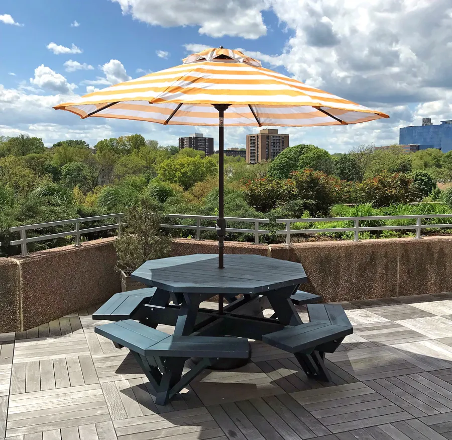 Octagonal Picnic Table (Options: 5' Diameter Tabletop, Attached Benches, Douglas-fir, Standard Tabletop, Rounded Corners, 2" Umbrella Hole, Custom Paint). Photo Courtesy of T. Dunne of Stamford, Connecticut.