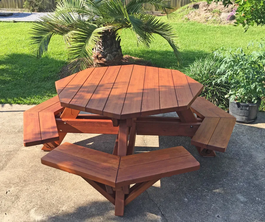 Octagonal Picnic Table (Options: 5' Diameter Tabletop, Attached Benches, Old-Growth Redwood, Standard Tabletop, Rounded Corners, No Umbrella Hole, Transparent Premium Sealant). Photo Courtesy of M. Gautier of Ocean Springs, MS.