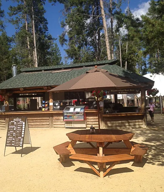 Octagonal Picnic Table (Options: 6' Diameter Tabletop, Attached Benches, Douglas-fir, Standard Tabletop, Rounded Corners, Umbrella Hole, Transparent Premium Sealant). Photo Courtesy of Jeff C. of Stanley, Idaho.