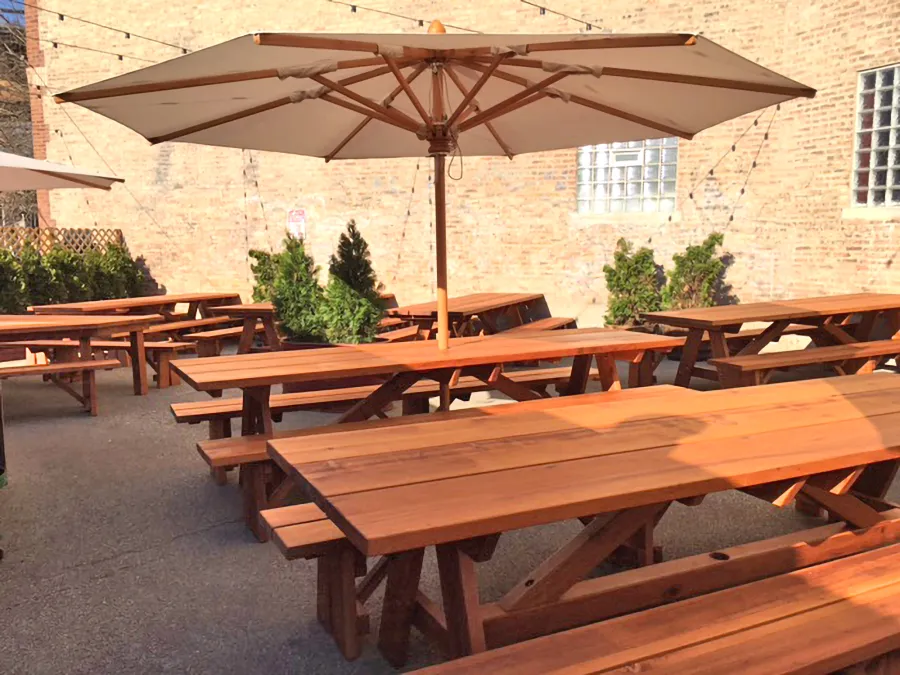 Custom Forever Picnic Tables (Unattached Benches) (Options: 10' L, 34 ½in W, Old-Growth, 2 Full Length Side Benches, Standard Tabletop, Squared Corners, 2 ½in Umbrella Hole, Standard Leg Flair, Transparent Premium). Using Two Tongue & Groove Matching 5 3/4" Boards to Create the Appearance of an 11 1/2" Wide Board Construction. Photo courtesy of Small Cheval Restaurant, 1732 N Milwaukee Ave, Chicago, IL 60647.