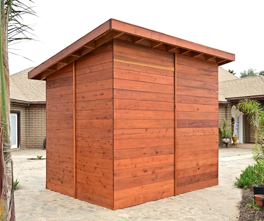 Raul’s Rad Redwood Sauna (Options: 11' W, 8' D, 11' H, California Redwood (for Interiors) & Mature Redwood (for Exteriors), Pitch Roof for Exterior Areas, "L" Shape Bench (2 levels), Transparent Premium Sealant).