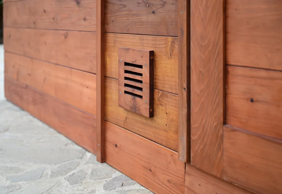 Raul’s Rad Redwood Sauna (Options: 11' W, 8' D, 11' H, California Redwood (for Interiors) & Mature Redwood (for Exteriors), Pitch Roof for Exterior Areas, "L" Shape Bench (2 levels), Transparent Premium Sealant).