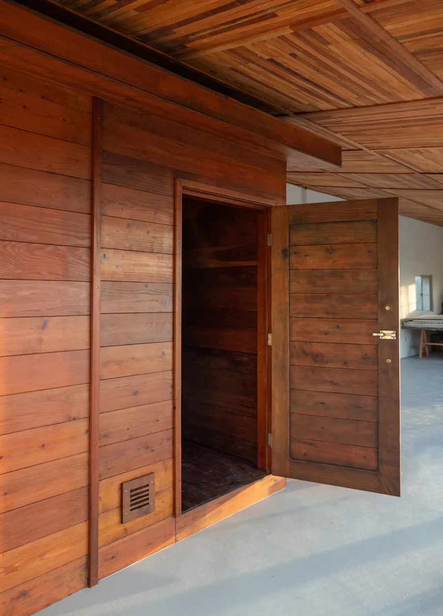 Raul’s Rad Redwood Sauna (Options: 11' W, 8' D, 11' H, California Redwood (for Interiors) & Mature Redwood (for Exteriors), Pitch Roof for Exterior Areas, "L" Shape Bench (2 levels), Transparent Premium Sealant).
