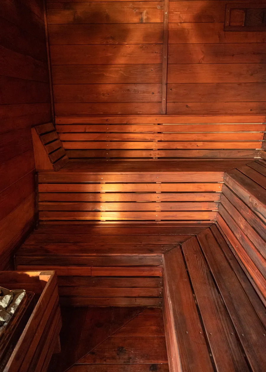 Raul’s Rad Redwood Sauna (Options: 11' W, 8' D, 11' H, California Redwood (for Interiors) & Mature Redwood (for Exteriors), Pitch Roof for Exterior Areas, "L" Shape Bench (2 levels), Transparent Premium Sealant).
