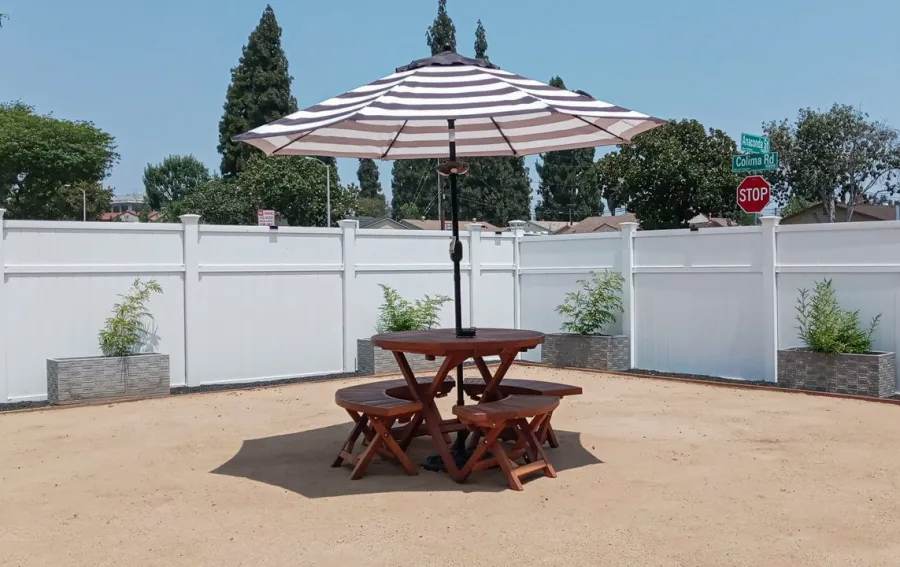 Round Wood Folding Picnic Table (Options: 42", Folding Arc Benches, California Redwood, 4 Folding Arc Benches, Standard Tabletop, Checkerboard Design Tabletop, 1 5/8" Umbrella Hole & Plug, Transparent Premium Sealant). Photo Courtesy of R. Jimenez of Whittier, CA.