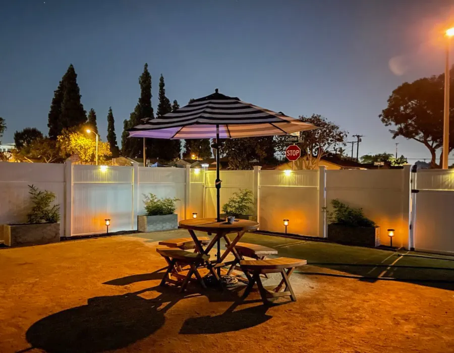 Round Wood Folding Picnic Table (Options: 42", Folding Arc Benches, California Redwood, 4 Folding Arc Benches, Standard Tabletop, Checkerboard Design Tabletop, 1 5/8" Umbrella Hole & Plug, Transparent Premium Sealant). Photo Courtesy of R. Jimenez of Whittier, CA.