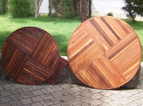 SIZE AND TABLETOP COMPARISON: Round Wood Folding Picnic Table - Left: 42" in Old-Growth Redwood with Standard Tabletop Spacing, Right: 52" Diameter in Mature Redwood with the Seamless Tabletop Spacing.