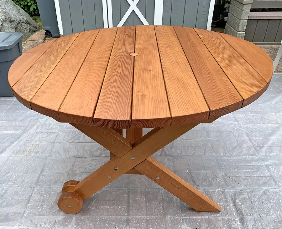 Round Wood Picnic Table with Wheels (Options: 5' Diameter, No Seating, Douglas-fir, Standard Tabletop, No Lazy Susan, 1-5/8in Umbrella Hole, Transparent Premium Sealant). Photo Taken After Clean and Touch Up the Table, One Year After Installation. Photo Courtesy of L. LaPorte of Lincoln Park, New Jersey.