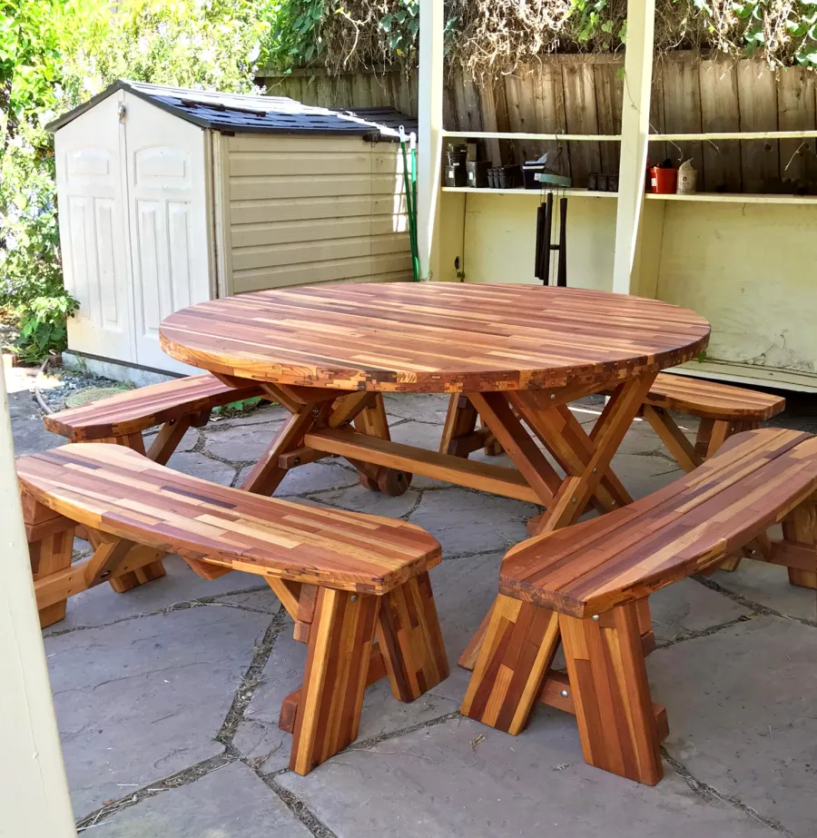 Round Wood Picnic Table with Wheels (Options: 5' Diameter, Unattached Benches, Mosaic Reclaim Wood, Round Picnic Benches, Standard Tabletop, No Lazy Susan, No Umbrella Hole, Transparent Premium Sealant). Photo Courtesy of A. McChesney-Young of Berkeley, California.