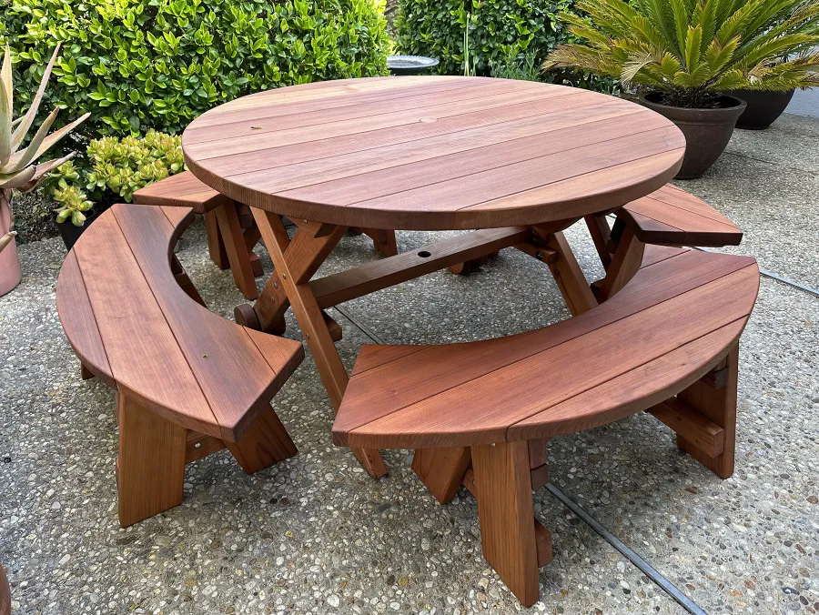 Round Wood Picnic Table with Wheels (Options: 4.5' Diameter, Arc Picnic Benches, Mature Redwood, Round Picnic Benches, Standard Tabletop, No Lazy Susan, 1 5/8" Umbrella Hole & Plug, Transparent Premium Sealant). Photo Courtesy of L. Moore of Santa Barbara, CA.