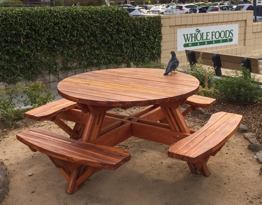 Round Wooden Picnic Tables (Attached Benches) (Options: 5' Diameter, Attached Benches, Mosaic Redwood, Standard Tabletop, No Lazy Susan, Umbrella Hole & Plug, Transparent Premium Sealant). Photo Courtesy of Whole Foods Market of San Rafael, CA.