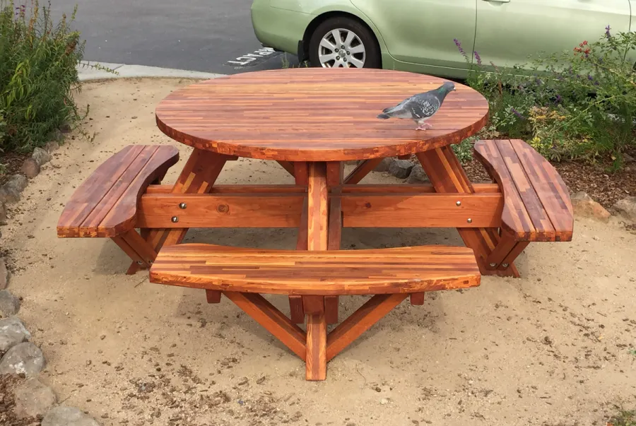 Round Wooden Picnic Tables (Attached Benches) (Options: 5' Diameter, Attached Benches, Mosaic Redwood, Standard Tabletop, No Lazy Susan, Umbrella Hole & Plug, Transparent Premium Sealant). Photo Courtesy of Whole Foods Market of San Rafael, CA.