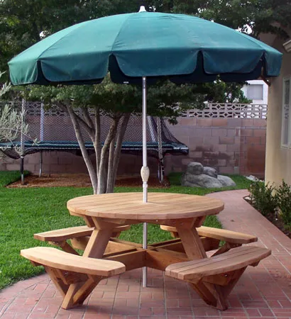 Round Wooden Picnic Tables (Attached Benches) (Options: 4.5' Diameter, Attached Benches,  Mature Redwood, Standard Tabletop, No Lazy Susan, Umbrella Hole & Plug, Unfinished). We do not sell umbrellas, but we can drill an umbrella hole for you.