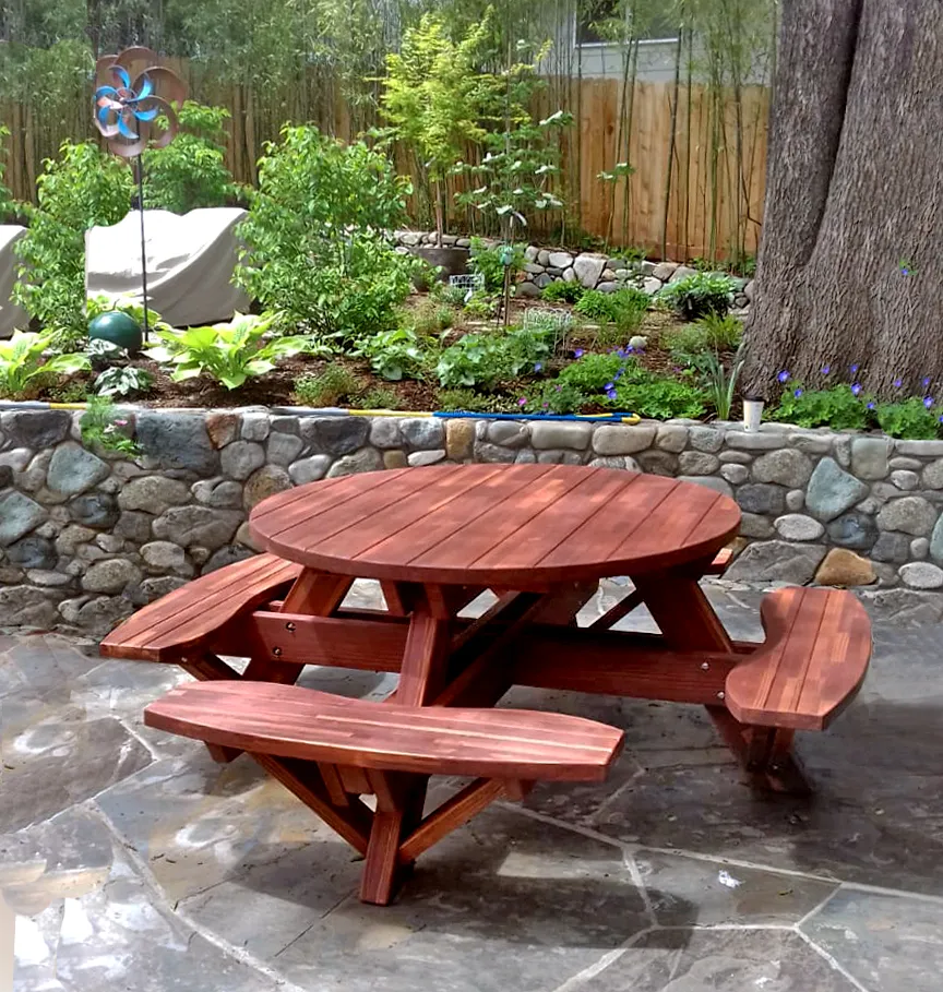 Round Wooden Picnic Tables (Attached Benches) (Options: 4.5' Diameter, Attached Benches, California Redwood, Standard Tabletop, No Lazy Susan, No Umbrella Hole & Plug, Coffee-Stain Premium Sealant). Photo Courtesy of D. Kenyon of Ashland, Oregon.