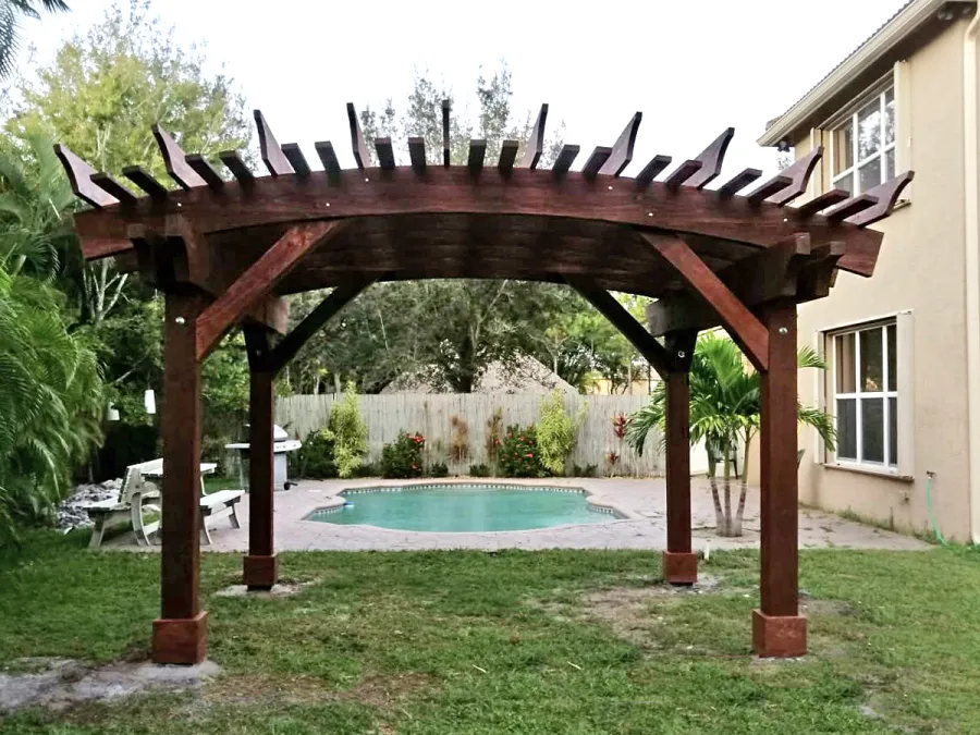 Sebastopol Pergolas (Options: 14' L x 16' Arc W, California Redwood, 4-Post Anchor Kit for High-Wind, No Ceiling Fan Base, 9' H Posts, Coffee-Stain Premium Sealant). Photo Courtesy of T. Green of Boynton Beach, Florida.