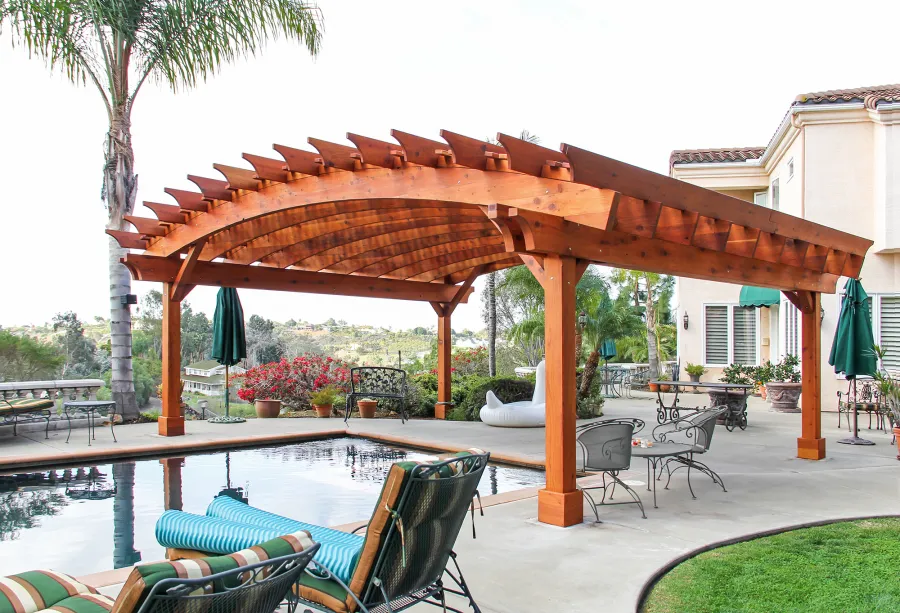 Sebastopol Pergolas (Options: 26' L x 24' Arc W, Mature Redwood, 4-Post Anchor Kit for High-Wind, Transparent Premium Sealant). Photo Courtesy of Ms. Diane Williams of Encinitas, CA. Photo shows extra large timber custom design with 8x8 posts and 2x10 arches, 26 ft long.