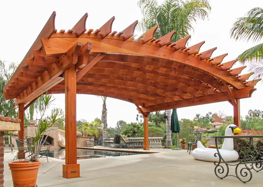 Sebastopol Pergolas (Options: 26' L x 24' Arc W, Mature Redwood, 4-Post Anchor Kit for High-Wind, Transparent Premium Sealant). Photo Courtesy of Ms. Diane Williams of Encinitas, CA. Photo shows extra large timber custom design with 8x8 posts and 2x10 arches, 26 ft long.