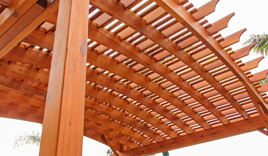 Sebastopol Pergolas (Options: 26' L x 24' Arc W, Mature Redwood, 4-Post Anchor Kit for High-Wind, Transparent Premium Sealant). Photo Courtesy of Ms. Diane Williams of Encinitas, CA. Photo shows extra large timber custom design with 8x8 posts and 2x10 arches, 26 ft long.