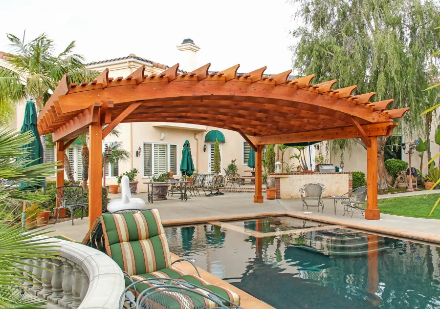 Sebastopol Pergolas (Options: 26' L x 24' Arc W, Mature Redwood, 4-Post Anchor Kit for High-Wind, Transparent Premium Sealant). Photo Courtesy of Ms. Diane Williams of Encinitas, CA. Photo shows extra large timber custom design with 8x8 posts and 2x10 arches, 26 ft long.