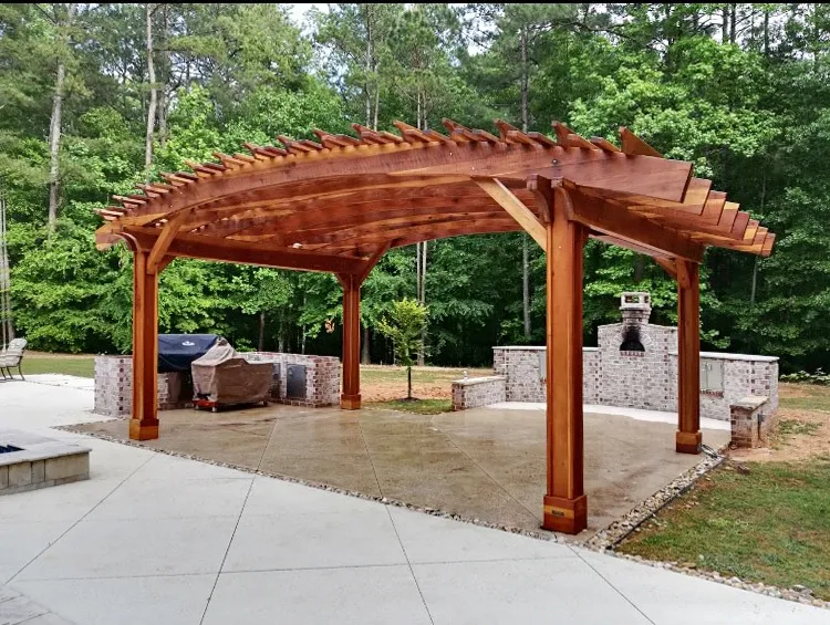 Sebastopol Pergolas (Options: 22' L x 16' Arc W, California Redwood, 4-Post Anchor Kit for Concrete, Vertical Post Decorative Trims, No Ceiling Fan Base, Transparent Premium Sealant). Photo Courtesy of G. Merck of Fayetteville, Georgia. 