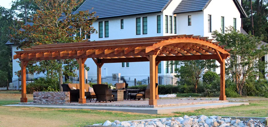 Sebastopol Pergolas (Options: 32' L x 24' Arc W, California Redwood, 6-Post Anchor Kit for High-Wind, No Ceiling Fan Base, Transparent Premium Sealant). Photo Courtesy of J. Graves of Santa Rosa Beach, Florida.
