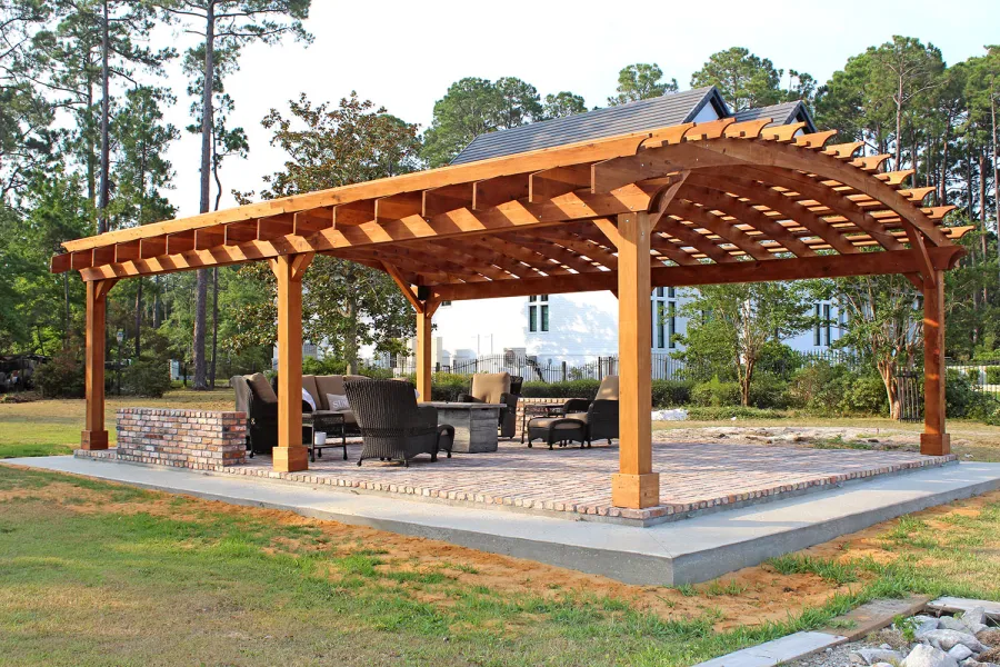 Sebastopol Pergolas (Options: 32' L x 24' Arc W, California Redwood, 6-Post Anchor Kit for High-Wind, No Ceiling Fan Base, Transparent Premium Sealant). Photo Courtesy of J. Graves of Santa Rosa Beach, Florida.