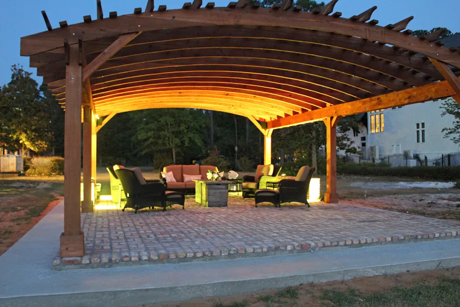 Sebastopol Pergolas (Options: 32' L x 24' Arc W, California Redwood, 6-Post Anchor Kit for High-Wind, No Ceiling Fan Base, Transparent Premium Sealant). Photo Courtesy of J. Graves of Santa Rosa Beach, Florida.