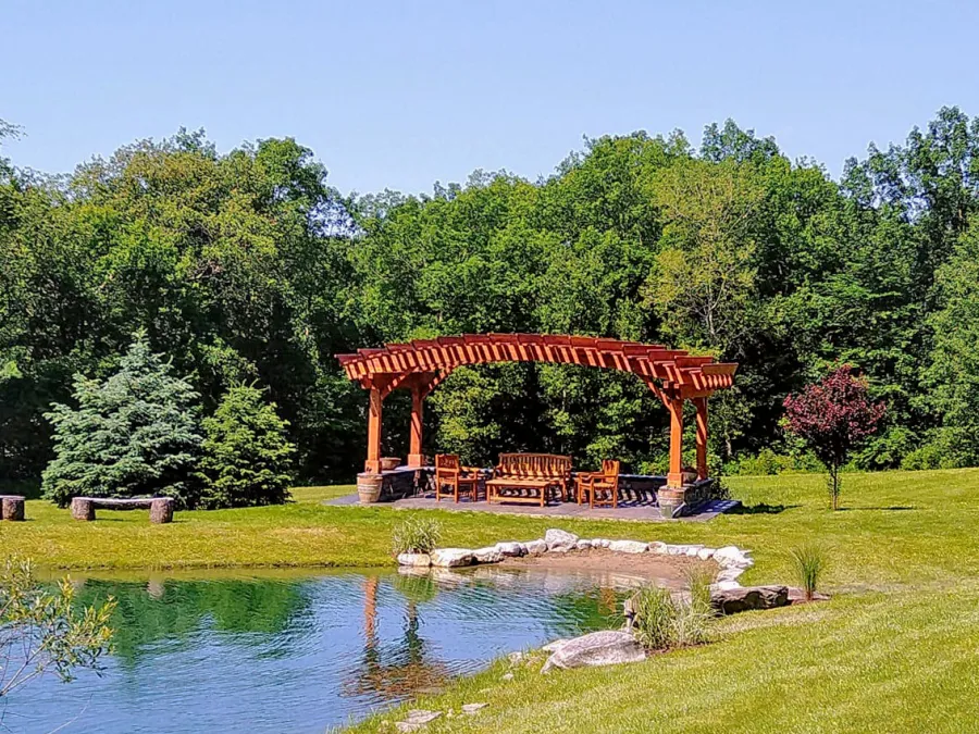Sebastopol Pergolas (Options: 14' L x 22' Arc W, California Redwood, 4-Post Anchor Kit for High-Wind, Transparent Premium Sealant). Photo Courtesy of Peter King of Shaftsbury, Vermont.