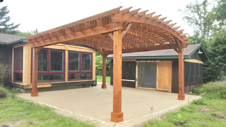 Sebastopol Pergolas (Options: 21' L x 19' Arc W, Mature Redwood, 4-Post Anchor Kit for High-Wind, with a Ceiling Fan Base, Transparent Premium Sealant). Photo Courtesy of R. Erickson of Sawyer, Michigan.