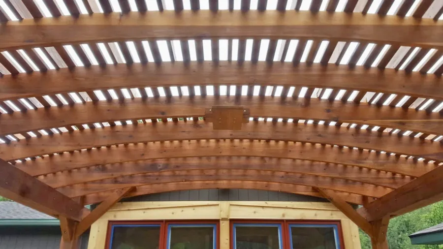 Sebastopol Pergolas (Options: 21' L x 19' Arc W, Mature Redwood, 4-Post Anchor Kit for High-Wind, with a Ceiling Fan Base, Transparent Premium Sealant). Photo Courtesy of R. Erickson of Sawyer, Michigan.