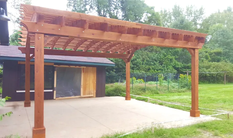 Sebastopol Pergolas (Options: 21' L x 19' Arc W, Mature Redwood, 4-Post Anchor Kit for High-Wind, with a Ceiling Fan Base, Transparent Premium Sealant). Photo Courtesy of R. Erickson of Sawyer, Michigan.