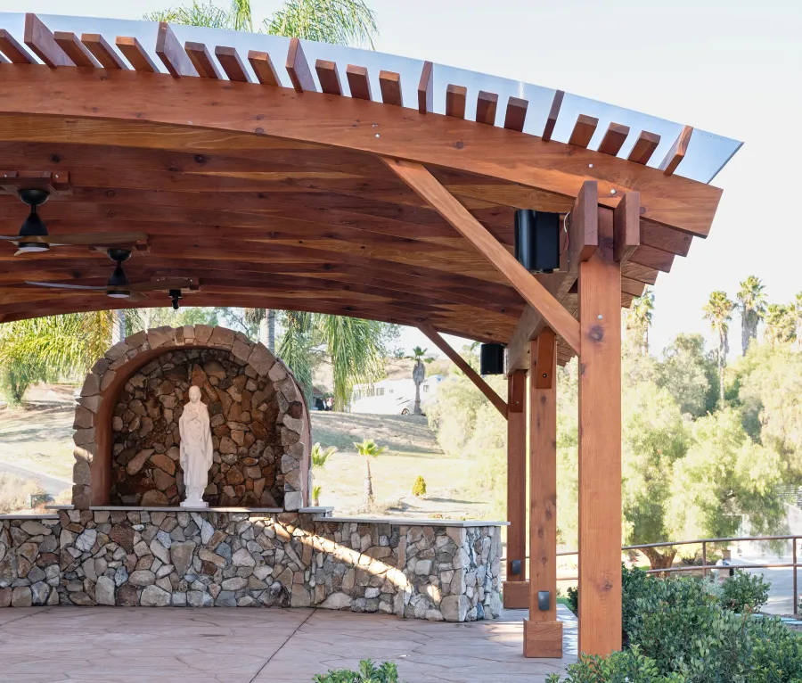Sebastopol Pergola (Options: 30' L x 24' Arc W, California Redwood, 4 Electrical Wiring Trims, Post Anchor Kit for Concrete, with Rain Guard, 2 Ceiling Fan Bases, Flash End Cuts, 9' Post Height, Transparent Premium Sealant). Photo Courtesy of the Sycuan Casino of San Diego, CA.