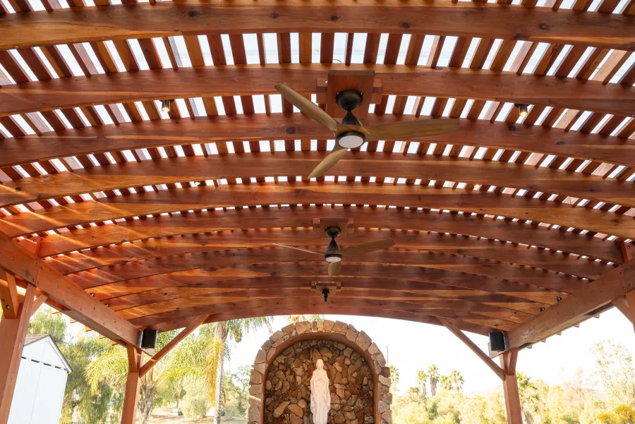 Sebastopol Pergola (Options: 30' L x 24' Arc W, California Redwood, 4 Electrical Wiring Trims, Post Anchor Kit for Concrete, with Rain Guard, 2 Ceiling Fan Bases, Flash End Cuts, 9' Post Height, Transparent Premium Sealant). Photo Courtesy of the Sycuan Casino of San Diego, CA.