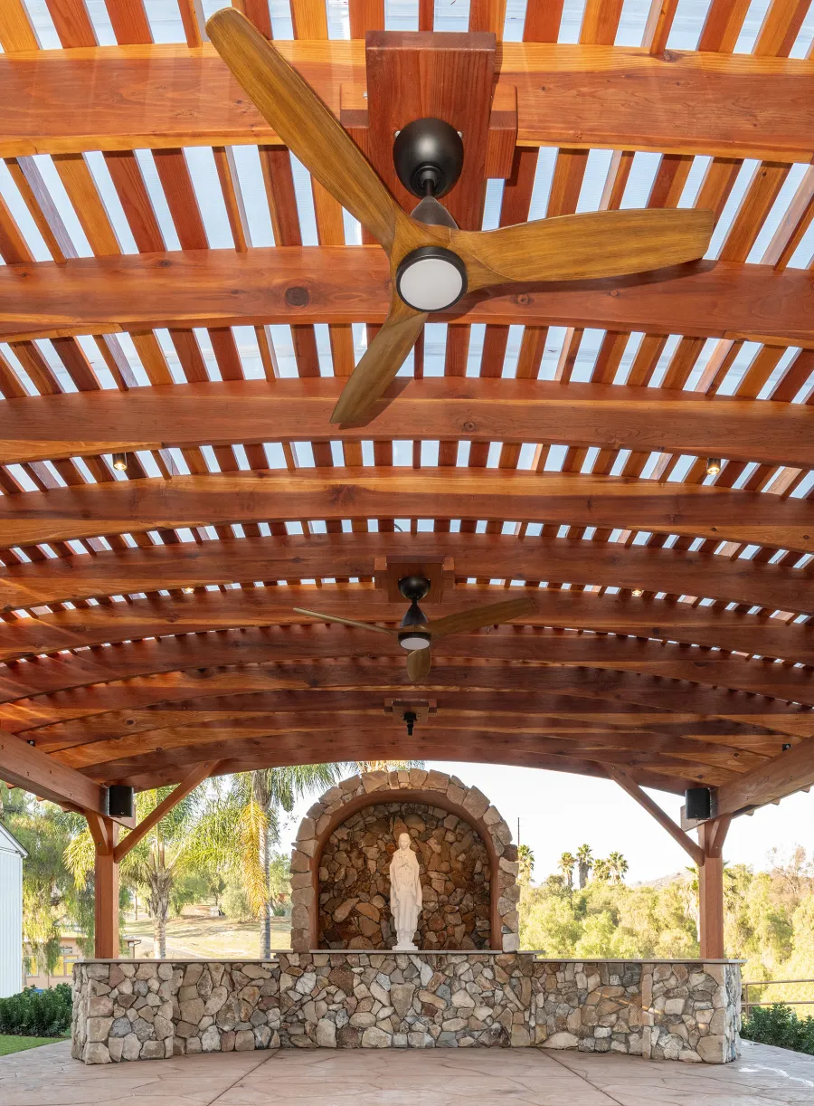 Sebastopol Pergola (Options: 30' L x 24' Arc W, California Redwood, 4 Electrical Wiring Trims, Post Anchor Kit for Concrete, with Rain Guard, 2 Ceiling Fan Bases, Flash End Cuts, 9' Post Height, Transparent Premium Sealant). Photo Courtesy of the Sycuan Casino of San Diego, CA.