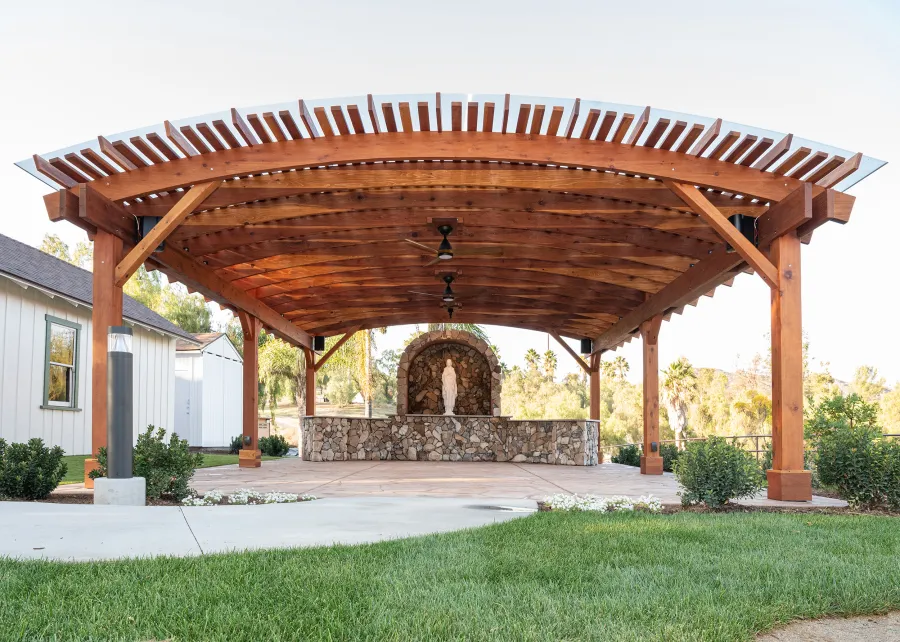 Sebastopol Pergola (Options: 30' L x 24' Arc W, California Redwood, 4 Electrical Wiring Trims, Post Anchor Kit for Concrete, with Rain Guard, 2 Ceiling Fan Bases, Flash End Cuts, 9' Post Height, Transparent Premium Sealant). Photo Courtesy of the Sycuan Casino of San Diego, CA.