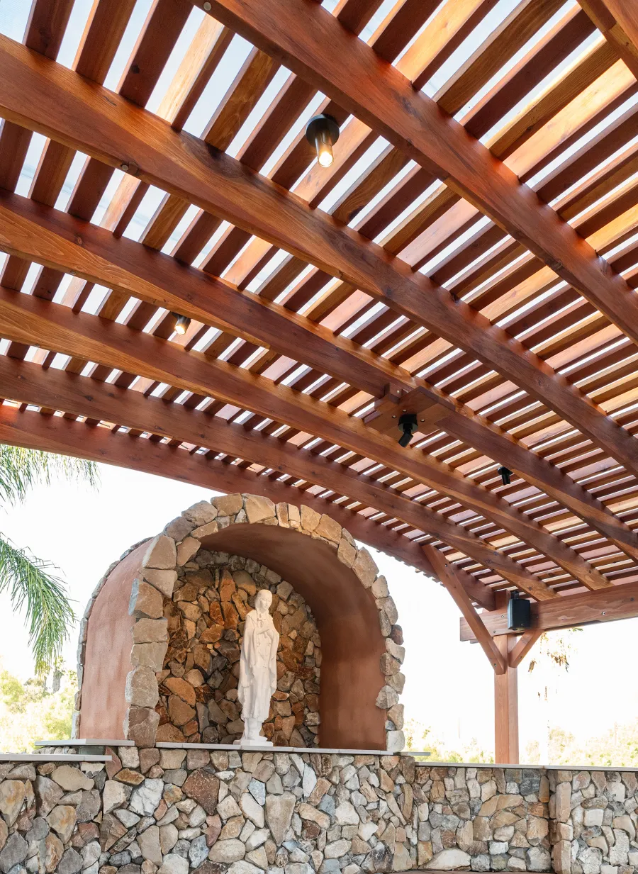 Sebastopol Pergola (Options: 30' L x 24' Arc W, California Redwood, 4 Electrical Wiring Trims, Post Anchor Kit for Concrete, with Rain Guard, 2 Ceiling Fan Bases, Flash End Cuts, 9' Post Height, Transparent Premium Sealant). Photo Courtesy of the Sycuan Casino of San Diego, CA.
