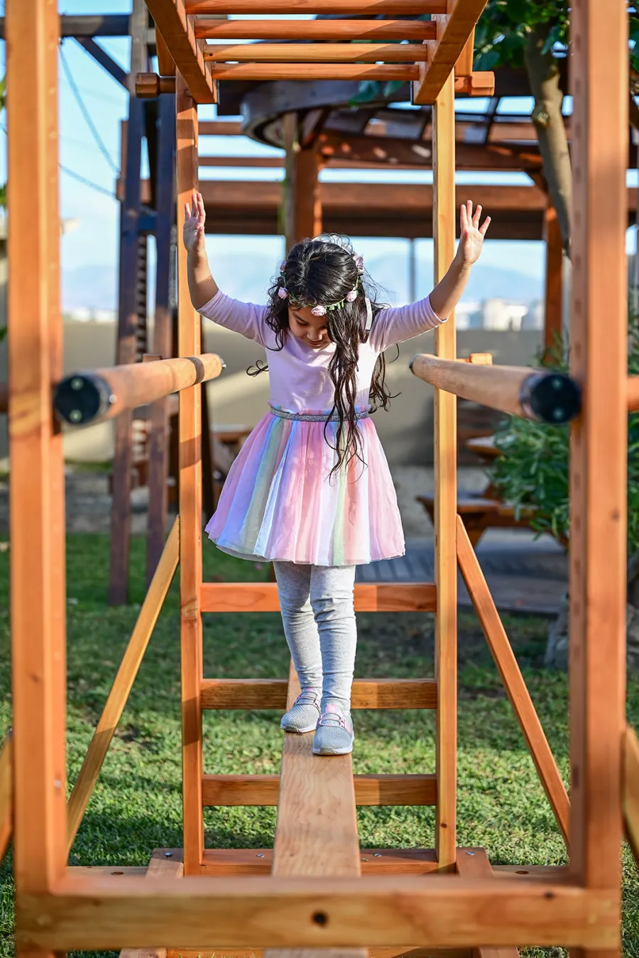 Custom Sheldon's Monkey Bars (Options: 8 ft H, 108.5 ft L, Douglas-fir, Standard Step Option, Transparent Premium Sealant) with Balance Beam and Parallel Bars. Extra Supports Added at the Bottom of the Monkey Bar. Balance Beam Can be Removed and Used Independently.