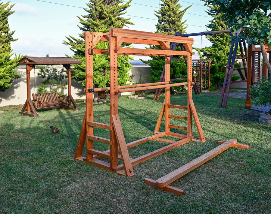 Custom Sheldon's Monkey Bars (Options: 8 ft H, 108.5 ft L, Douglas-fir, Standard Step Option, Transparent Premium Sealant) with Balance Beam and Parallel Bars. Extra Supports Added at the Bottom of the Monkey Bar. Balance Beam Can be Removed and Used Independently.